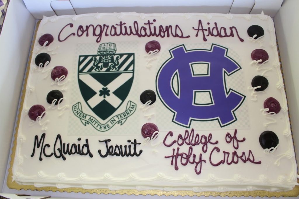 A sheet cake depicting my high school, McQuaid Jesuit, as well as Holy Cross