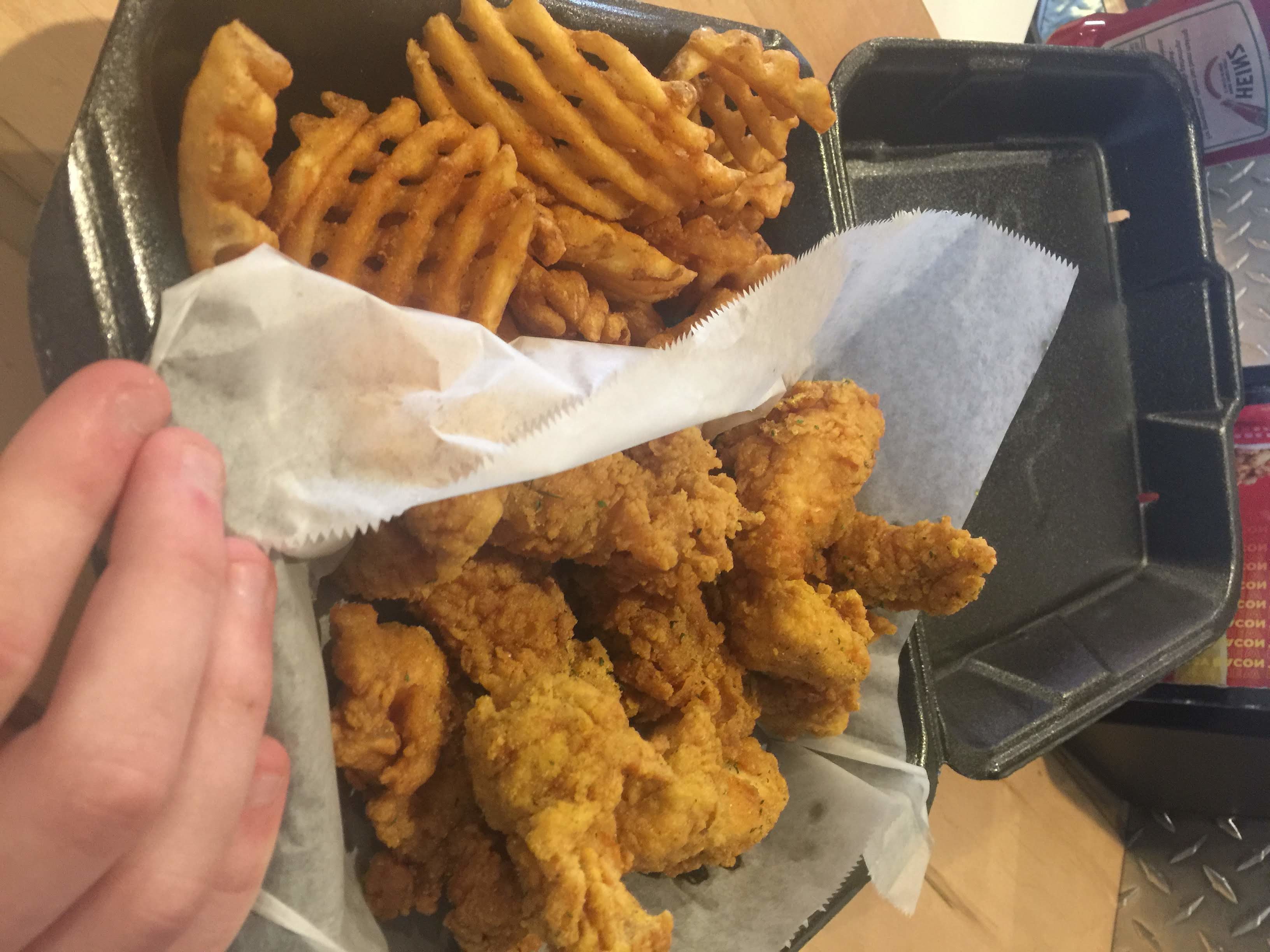 An order of boneless chicken wings and waffle fries from local restaurant Wings Over Worcester